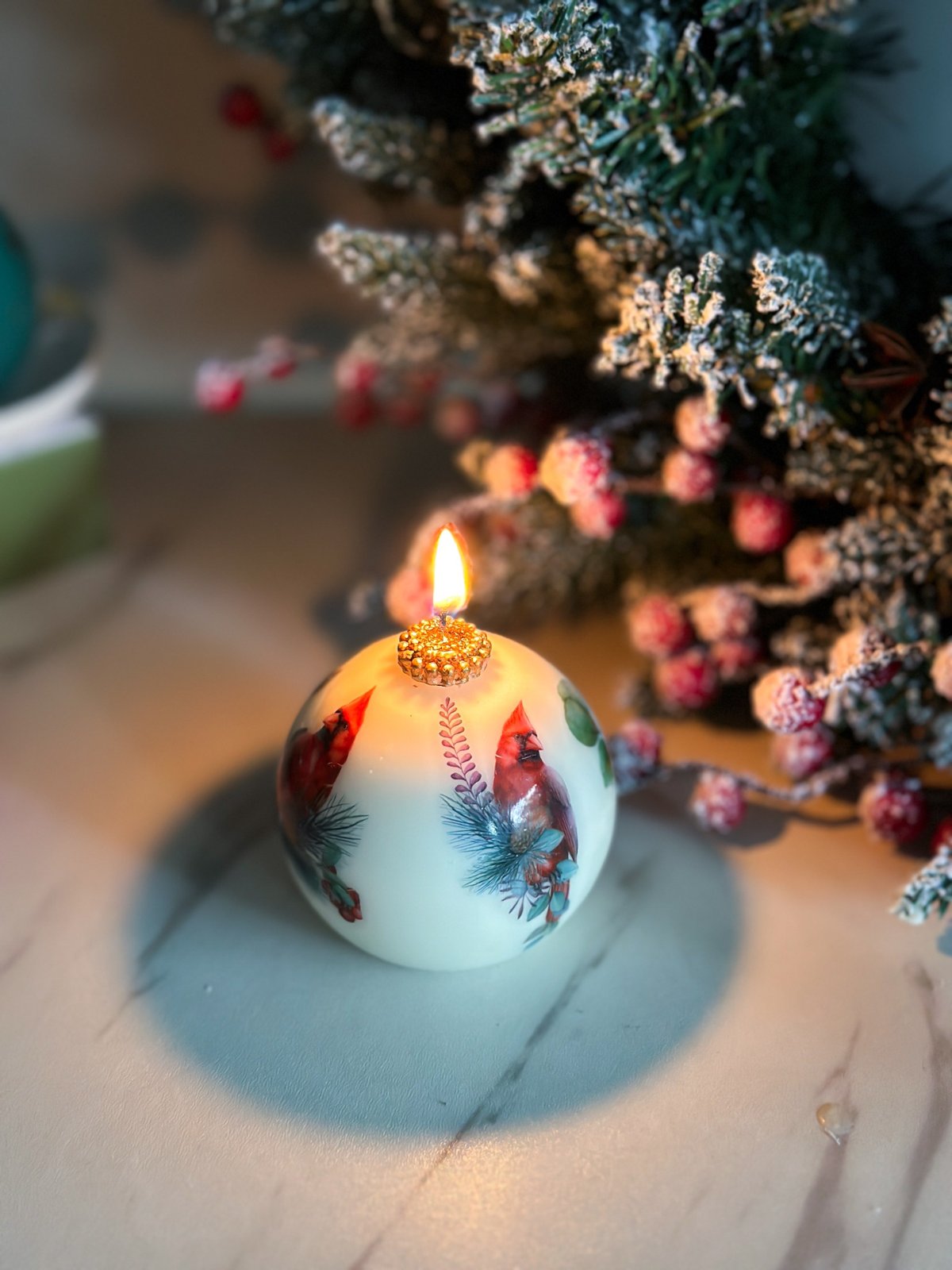 Candle with Cardinal in a gift box with a ribbon