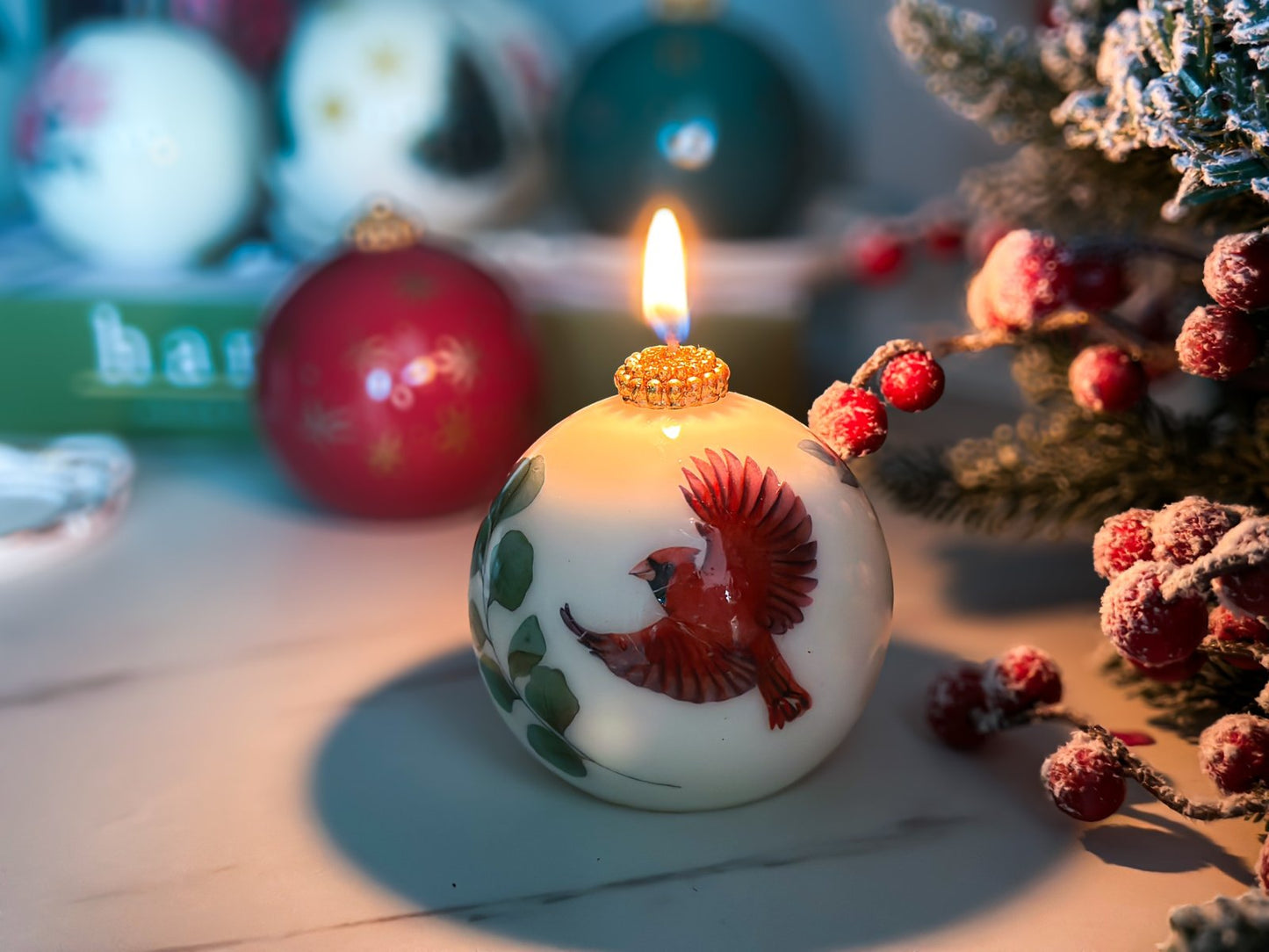 Candle with Cardinal in a gift box with a ribbon