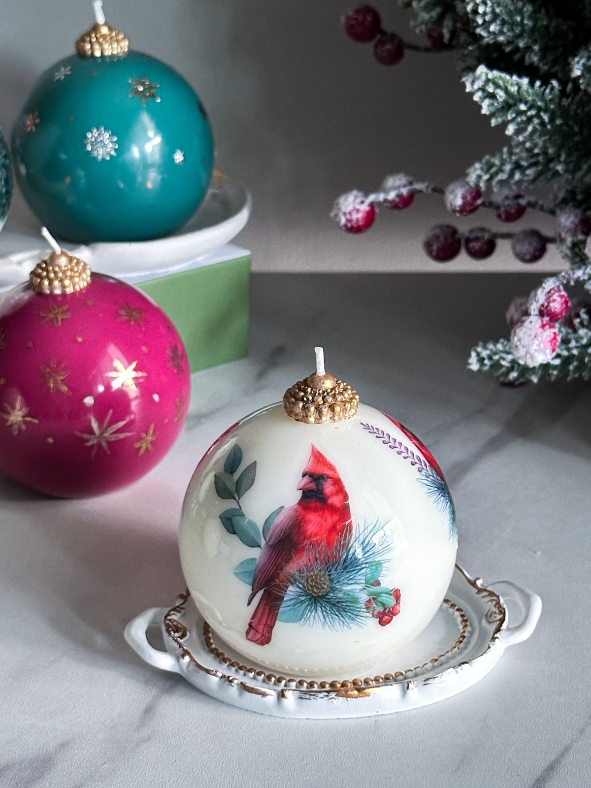 Candle with Cardinal in a gift box with a ribbon