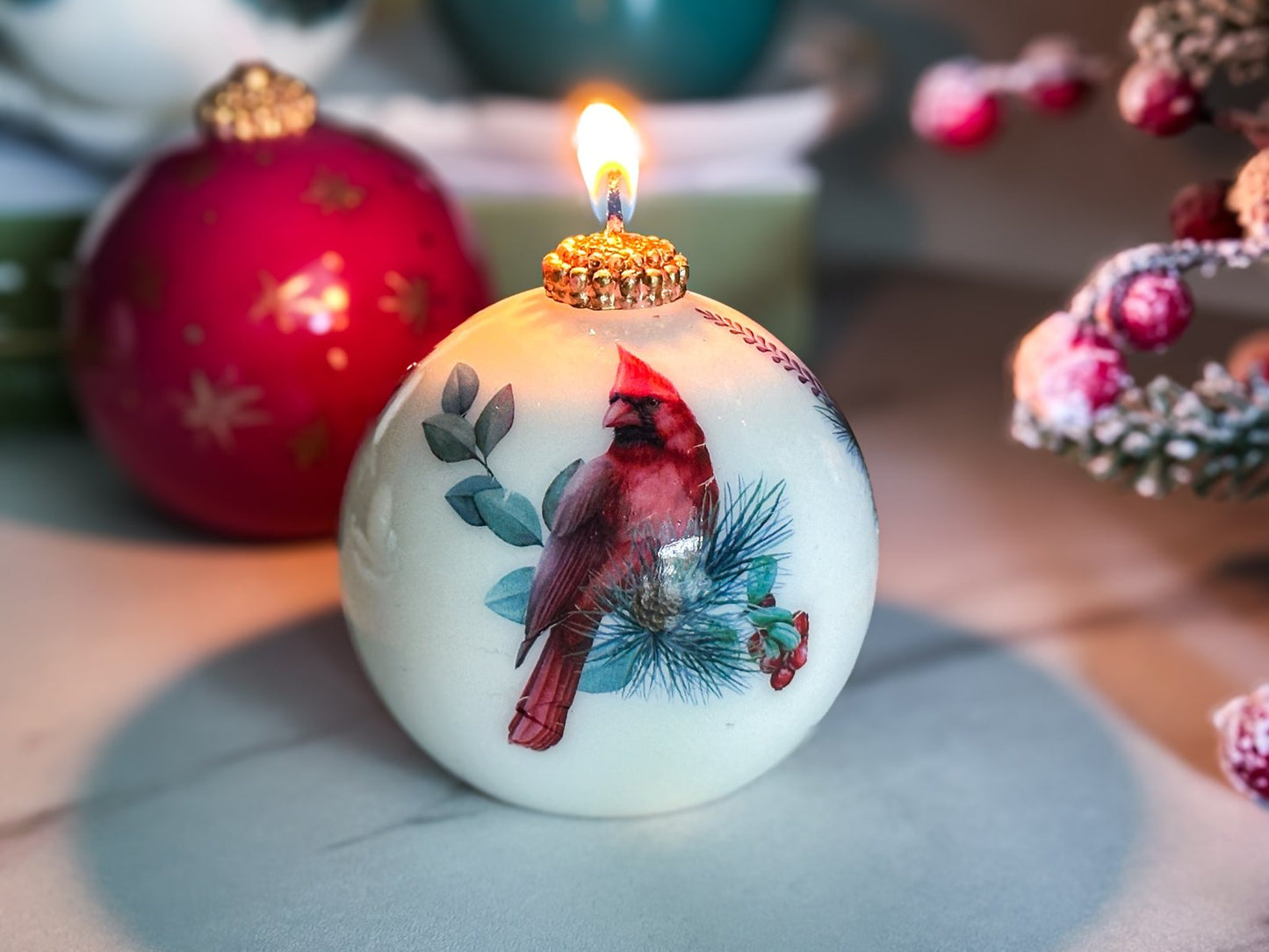 Candle with Cardinal in a gift box with a ribbon